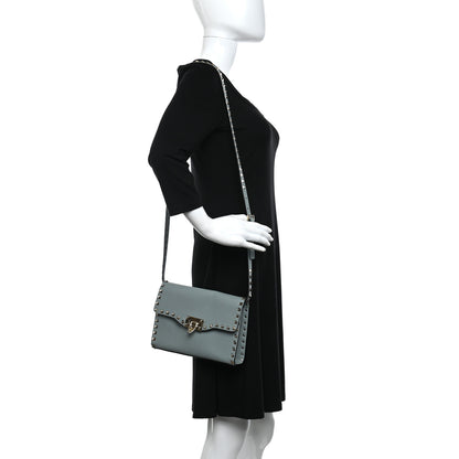 Valentino Garavani Pebbled Calfskin Medium Rockstud Flip Lock Crossbody Bag Nube 2 of 11