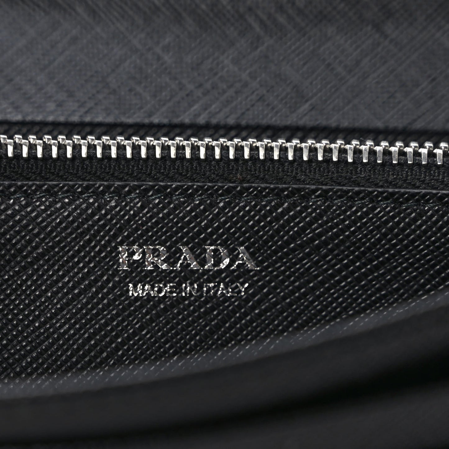 Saffiano Triangle Logo Continental Flap Travel Wallet Black