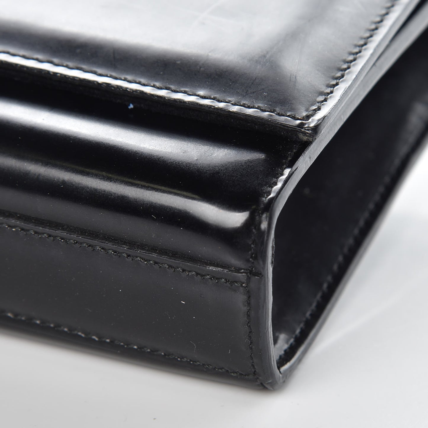 Patent Cassandre Tassel Clutch Black