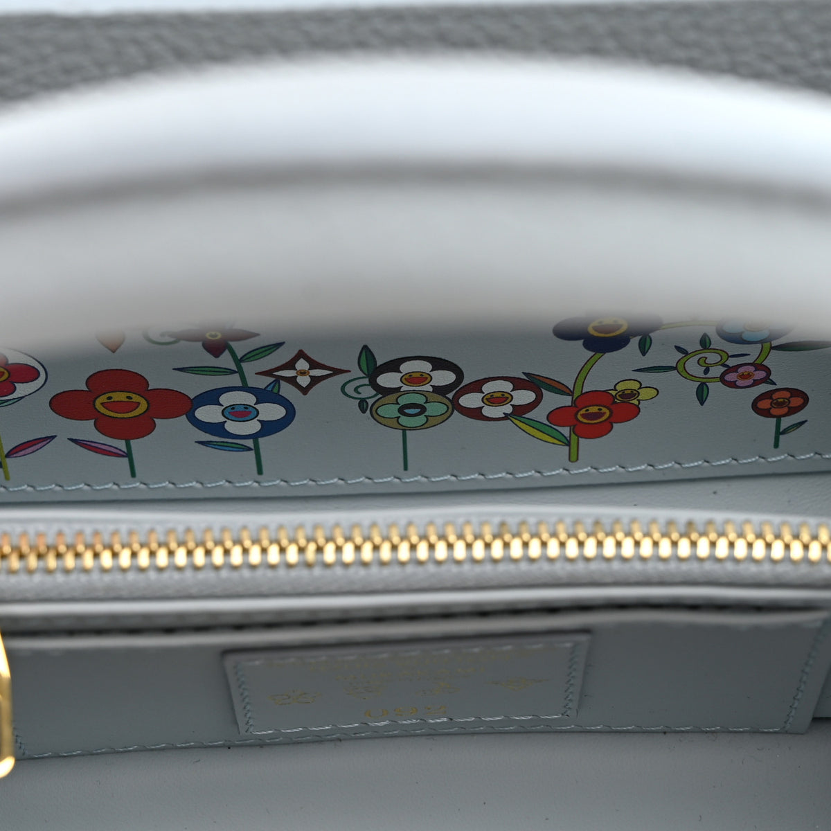 LV X TM Taurillon Capucines East West Mini Olympe Blue
