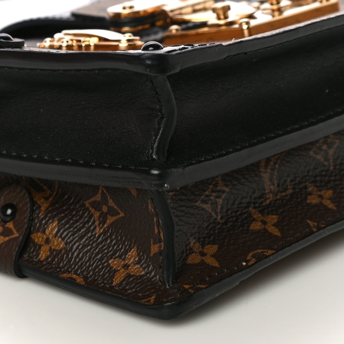 Reverse Monogram Trunk Clutch