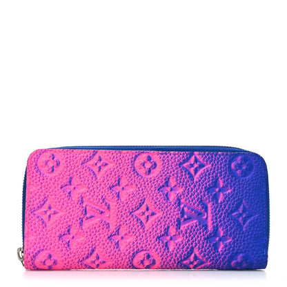 Louis Vuitton Taurillon Illusion Zippy Vertical Wallet Bleu Rose 1 of 11
