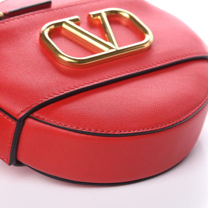 Valentino Garavani Calfskin VLogo Round Crossbody Bag Rouge Pur 7 of 8