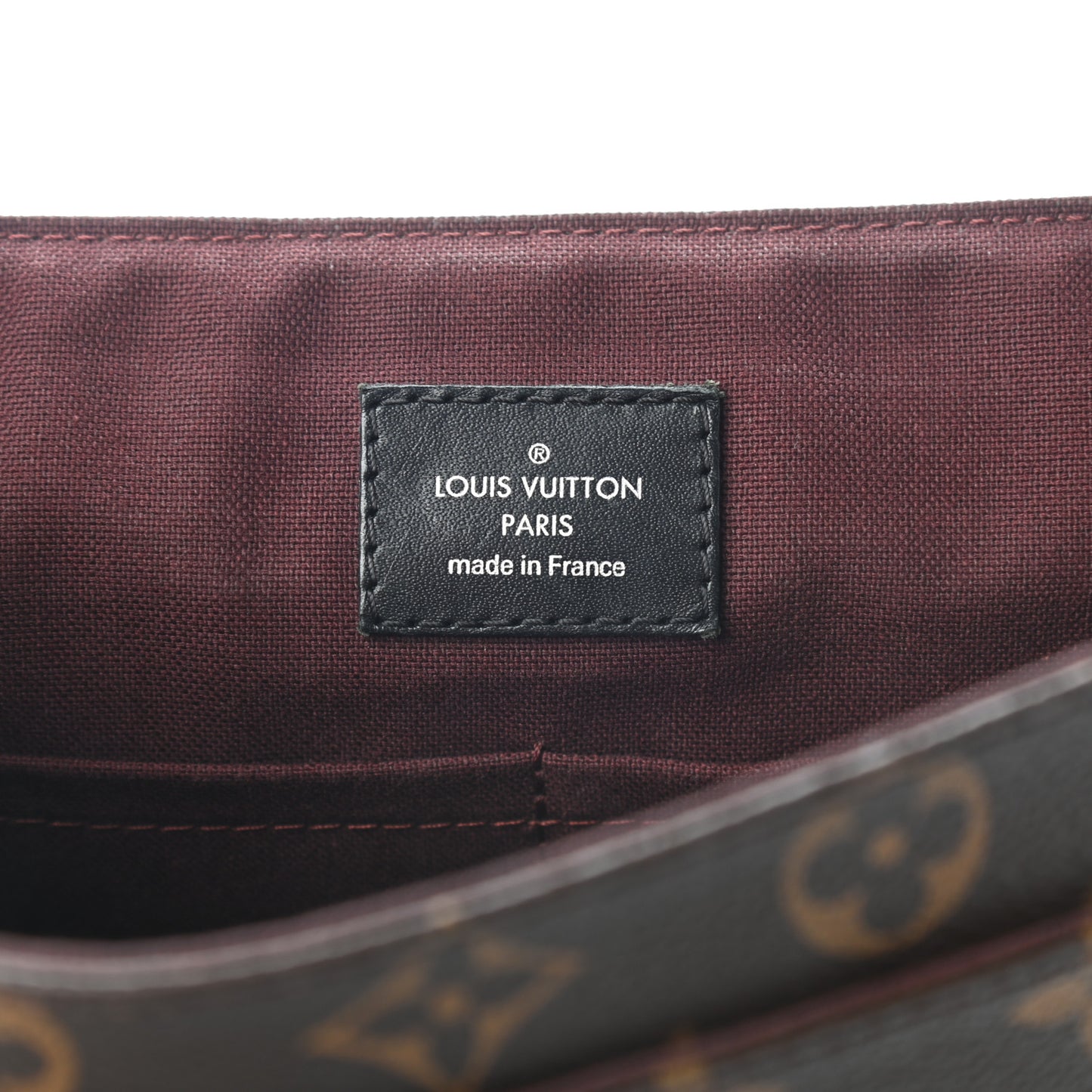 Monogram Macassar District PM