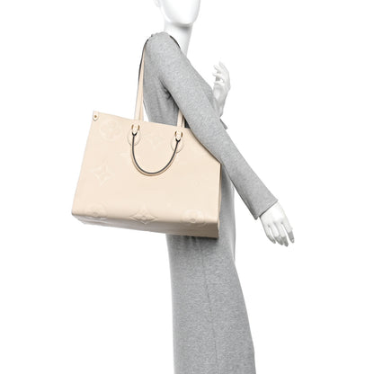 Louis Vuitton Empreinte Monogram Giant Onthego GM Creme 2 of 9