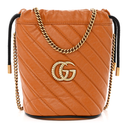 Gucci Vintage Effect Calfskin Matelasse Diagonal Mini Torchon GG Marmont 2.0 Bucket Bag Cognac 1 of 11