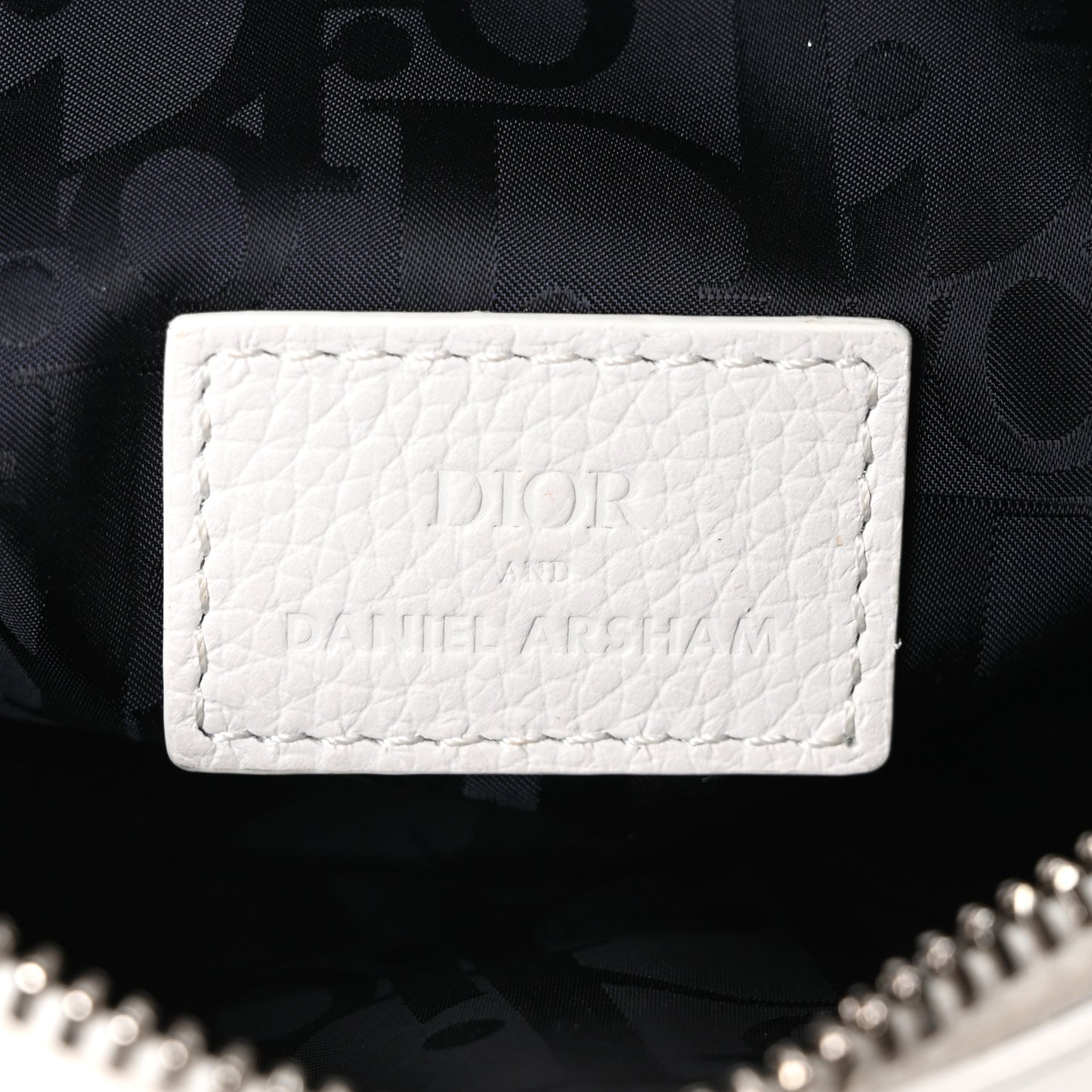 X DANIEL ARSHAM Grained Calfskin Newspaper Print Saddle Bag White
