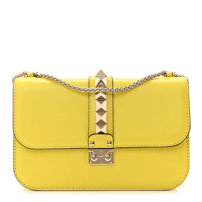 Valentino Garavani Vitello Medium Glam Lock Rockstud Flap Naples Yellow 1 of 7