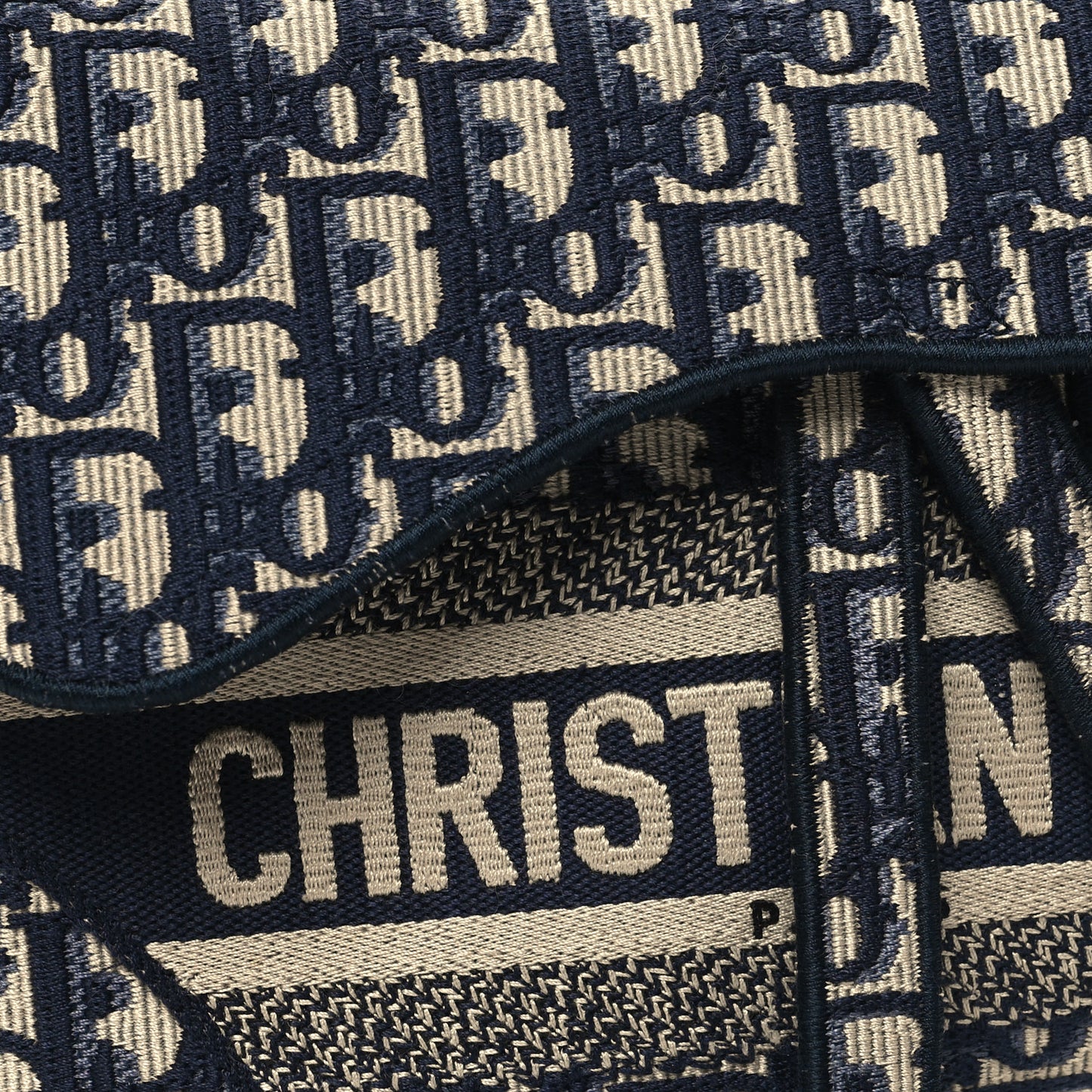 Oblique Embroidered Saddle Bag Blue