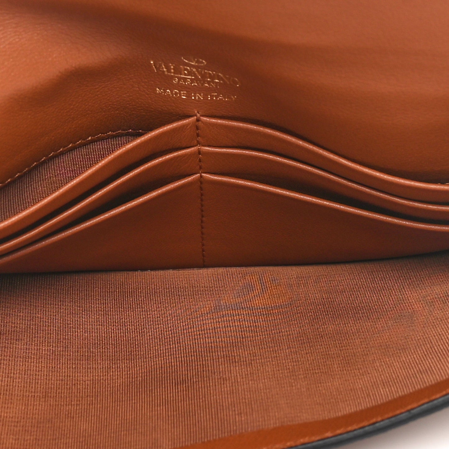 Grainy Calfskin Vlogo Wristlet Clutch Tan