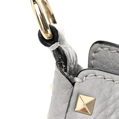 Valentino Garavani Pebbled Calfskin Mini Rockstud Flip-Lock Messenger Bag Pastel Grey 10 of 11