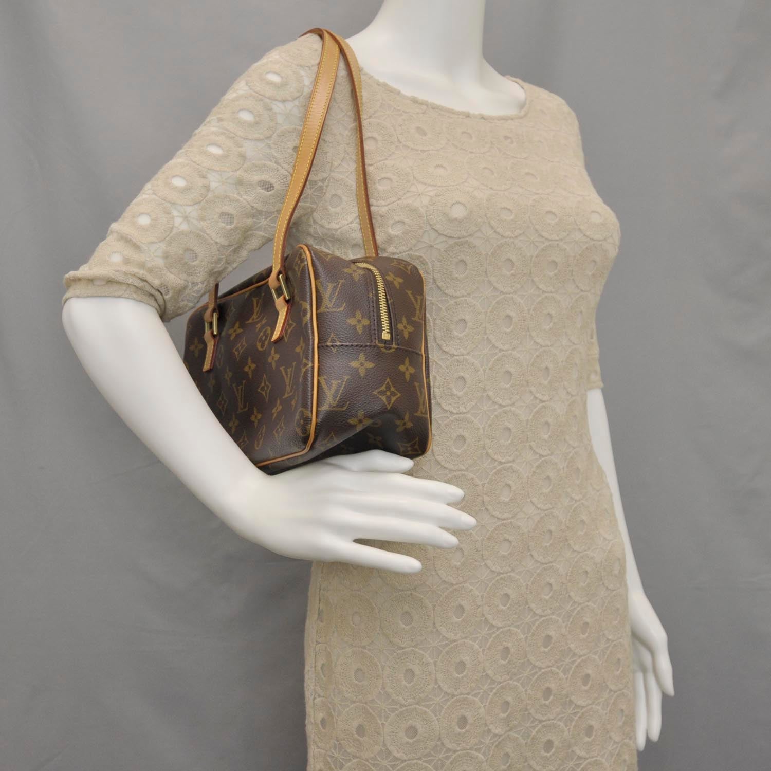 Louis Vuitton Monogram Cite MM 2 of 10