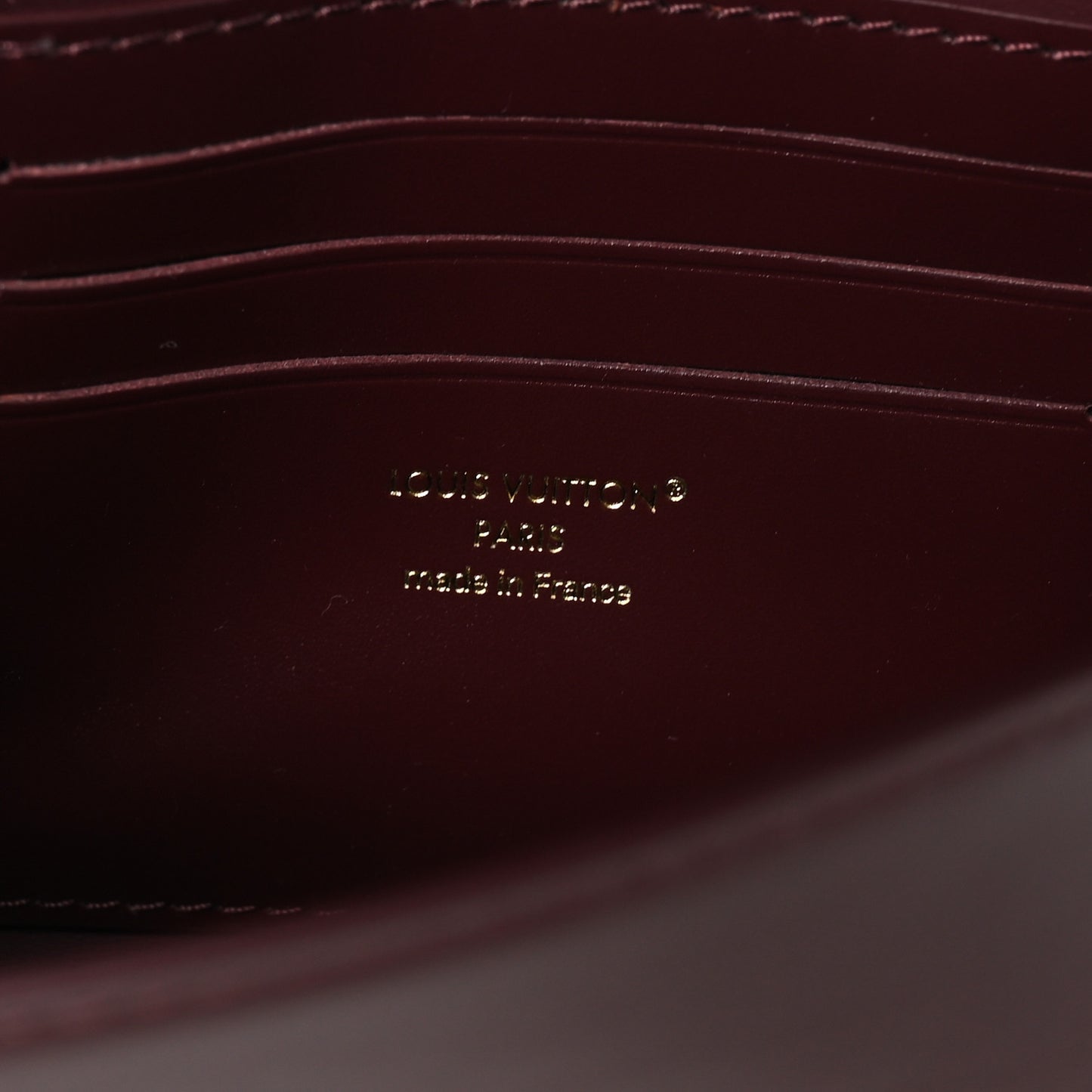 Calfskin LV Wallet On Chain Capucines Garnet