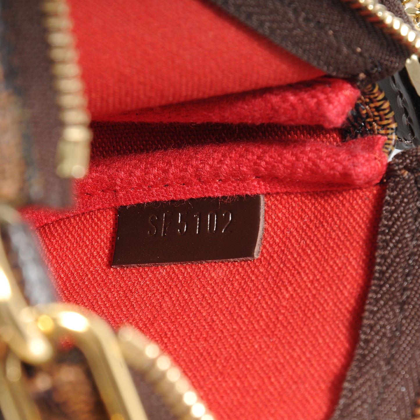 Damier Ebene Mini Pochette Accessories Bag