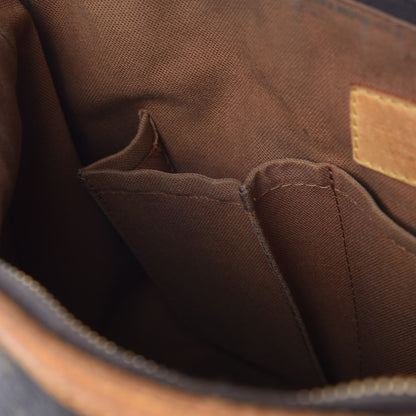 Louis Vuitton Monogram Tulum PM 9 of 16