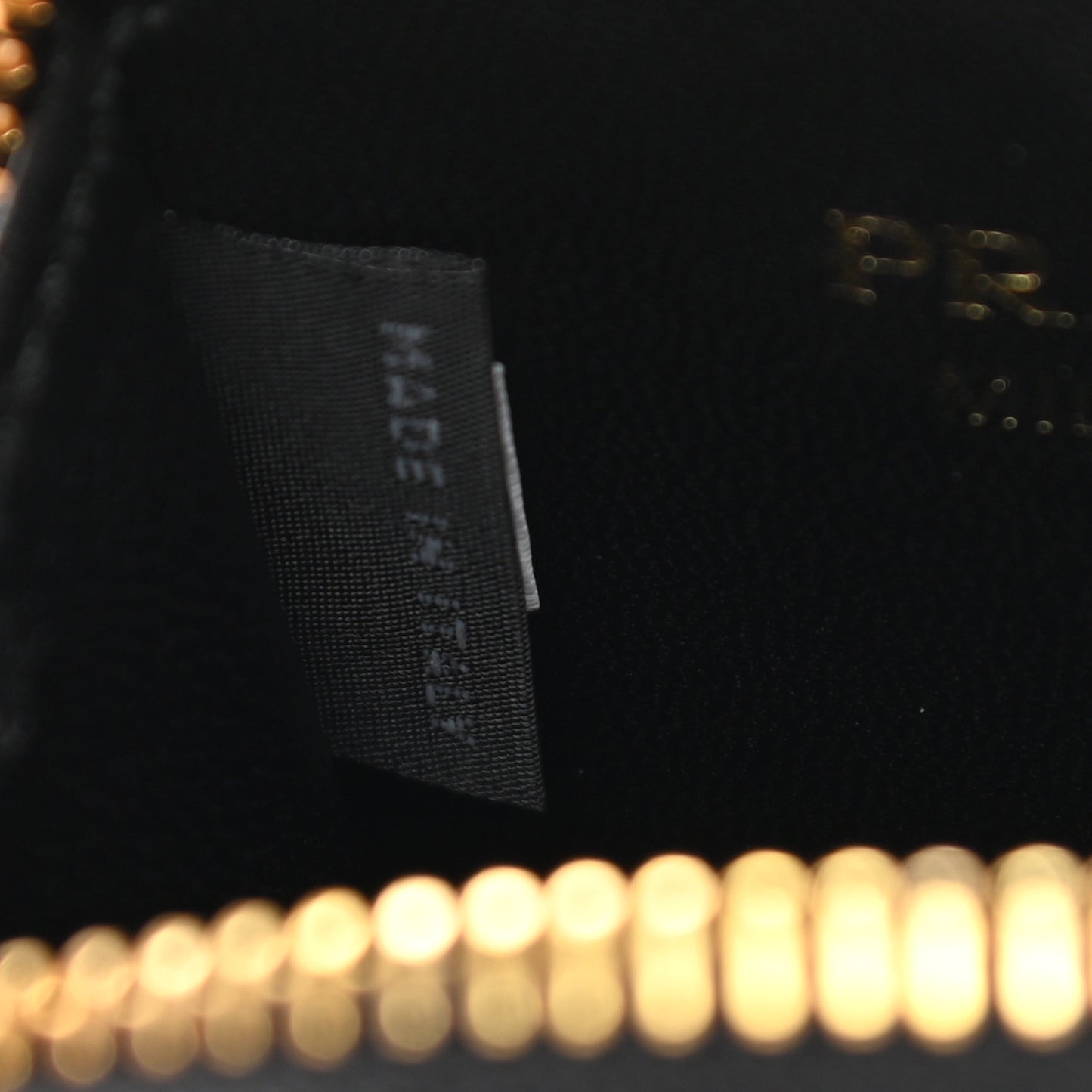 Saffiano Triangle Zip Around Mini Pouch Black