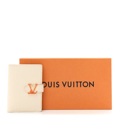 Louis Vuitton Taurillon Capucines Vertical Compact Wallet Pearly Cream Coral 7 of 7