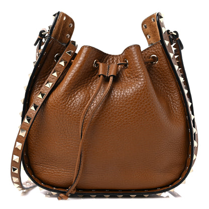 Valentino Garavani Grained Calfskin Rockstud Bucket Bag Bright Cognac 1 of 11