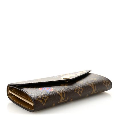 Louis Vuitton Monogram House Mascot Sarah Wallet NM Iced Gold 4 of 6