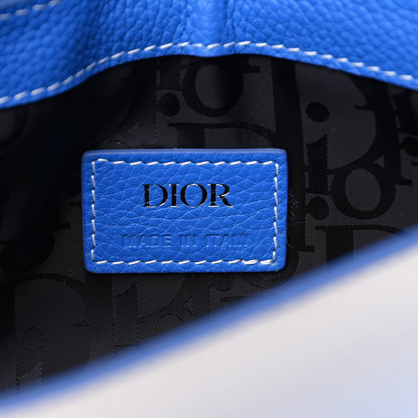 X KAWS Grained Calfskin Saddle Pouch
