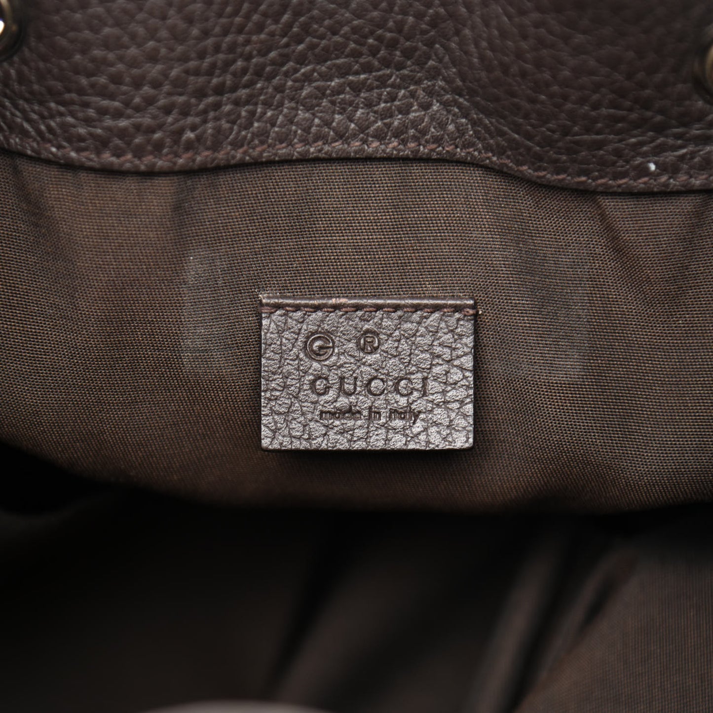 Monogram Dollar Calfskin O Drawstring Backpack Beige Ebony Testa di Moro Dark Chocolate