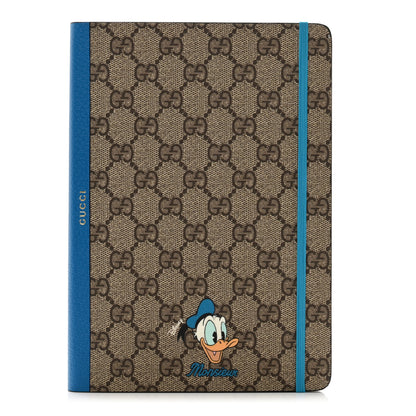 Gucci X DISNEY GG Supreme Monogram Textured Dollar Calfskin Donald Duck Notebook Beige Ebony Blue 1 of 7