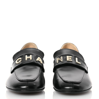 Chanel Shiny Calfskin Logo Loafers 37.5 Black 2 of 10