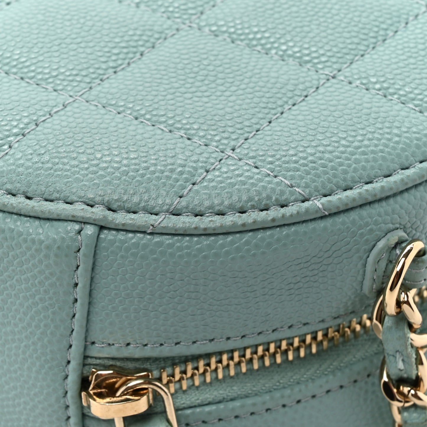 Caviar Quilted Round Clutch With Chain Light Blue