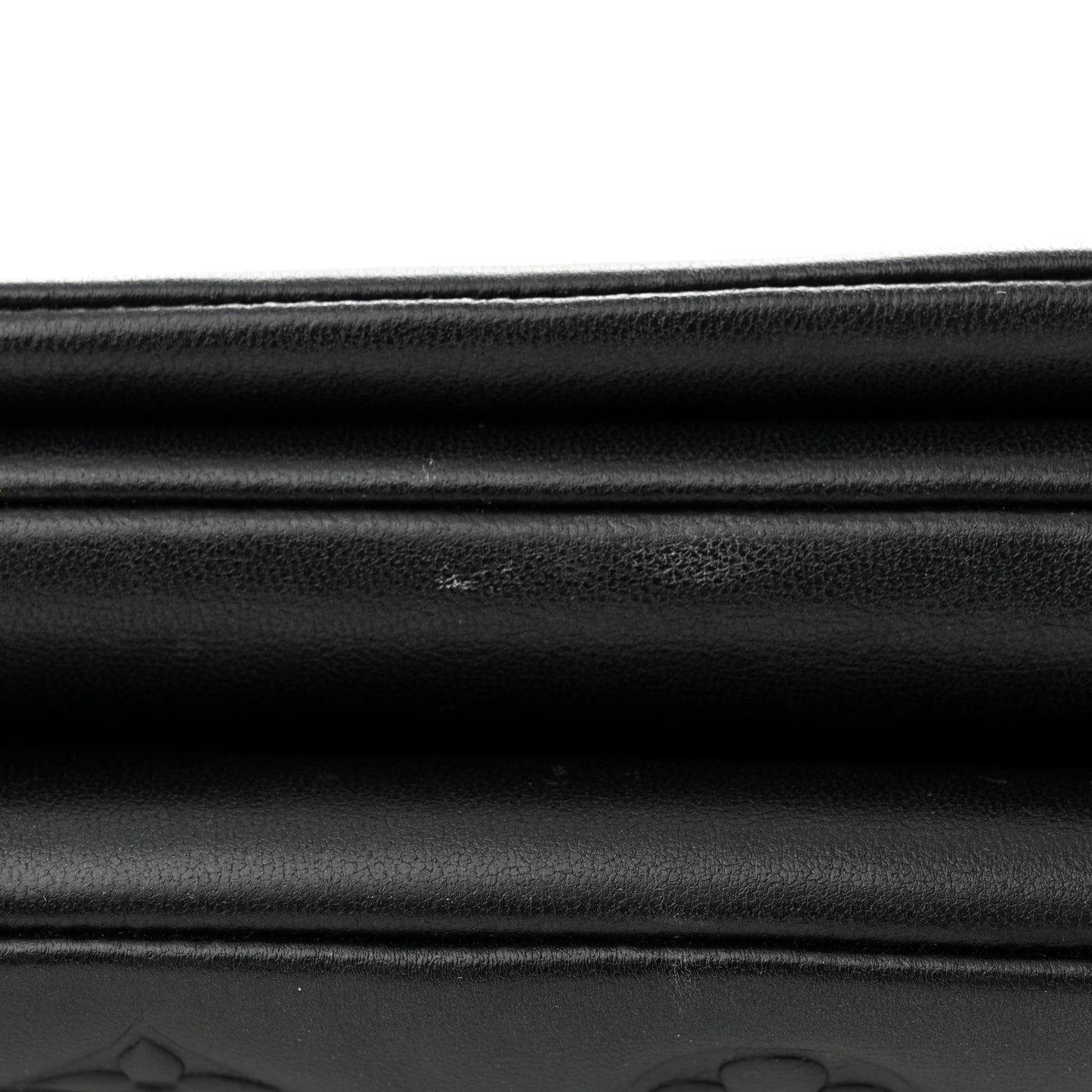 Lambskin Embossed Monogram Pochette Coussin Black