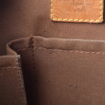 Louis Vuitton Monogram Tulum PM 9 of 23