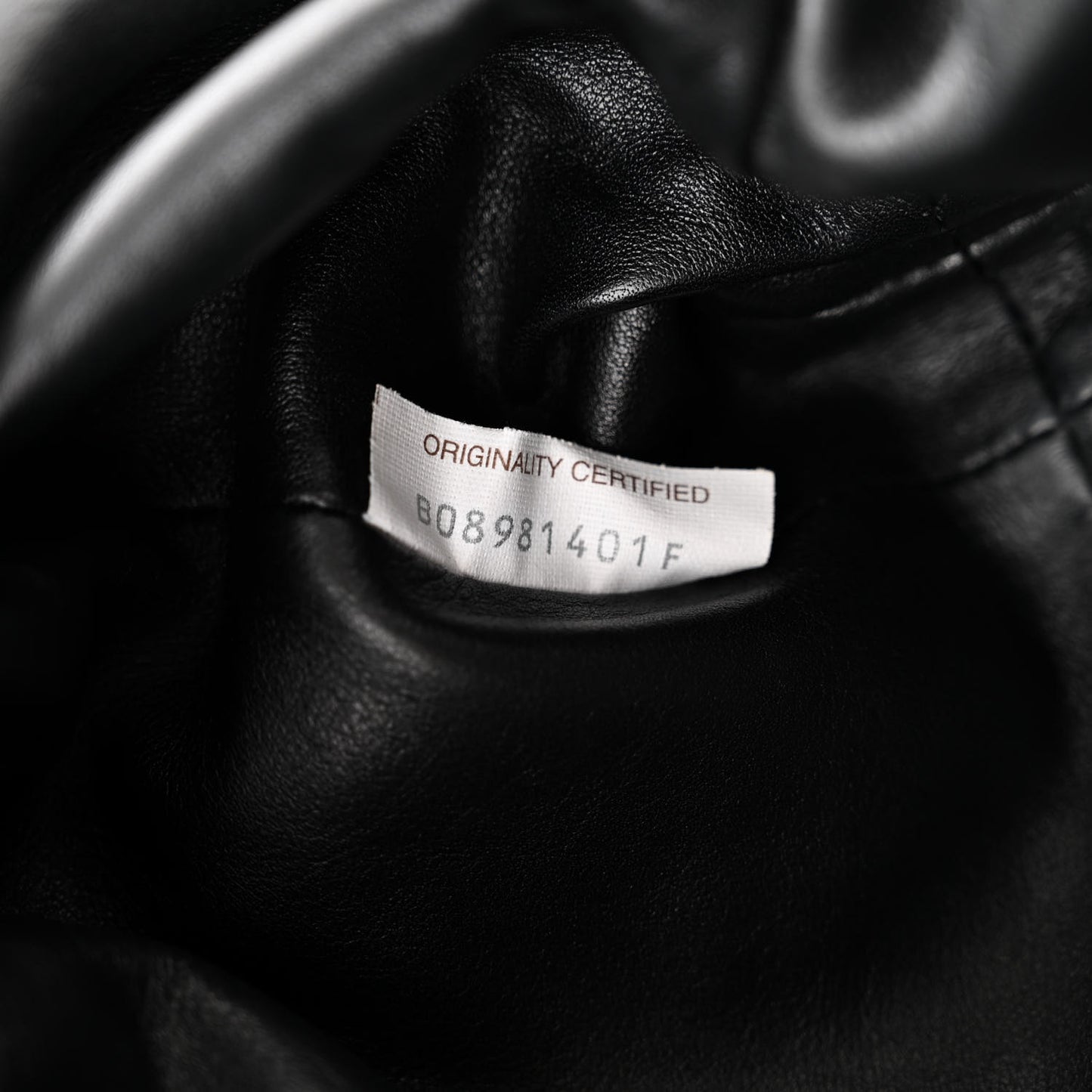 Butter Calfskin The Mini Pouch Black