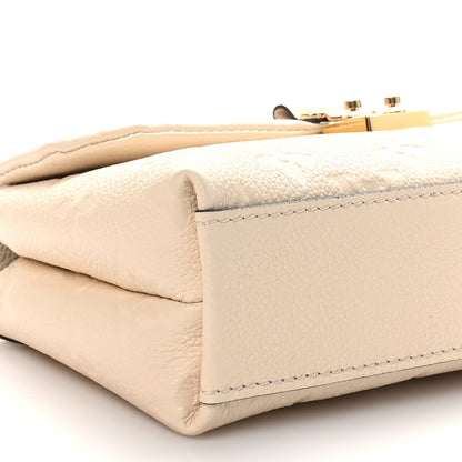 Louis Vuitton Empreinte Monogram Nano Madeleine Creme 8 of 10