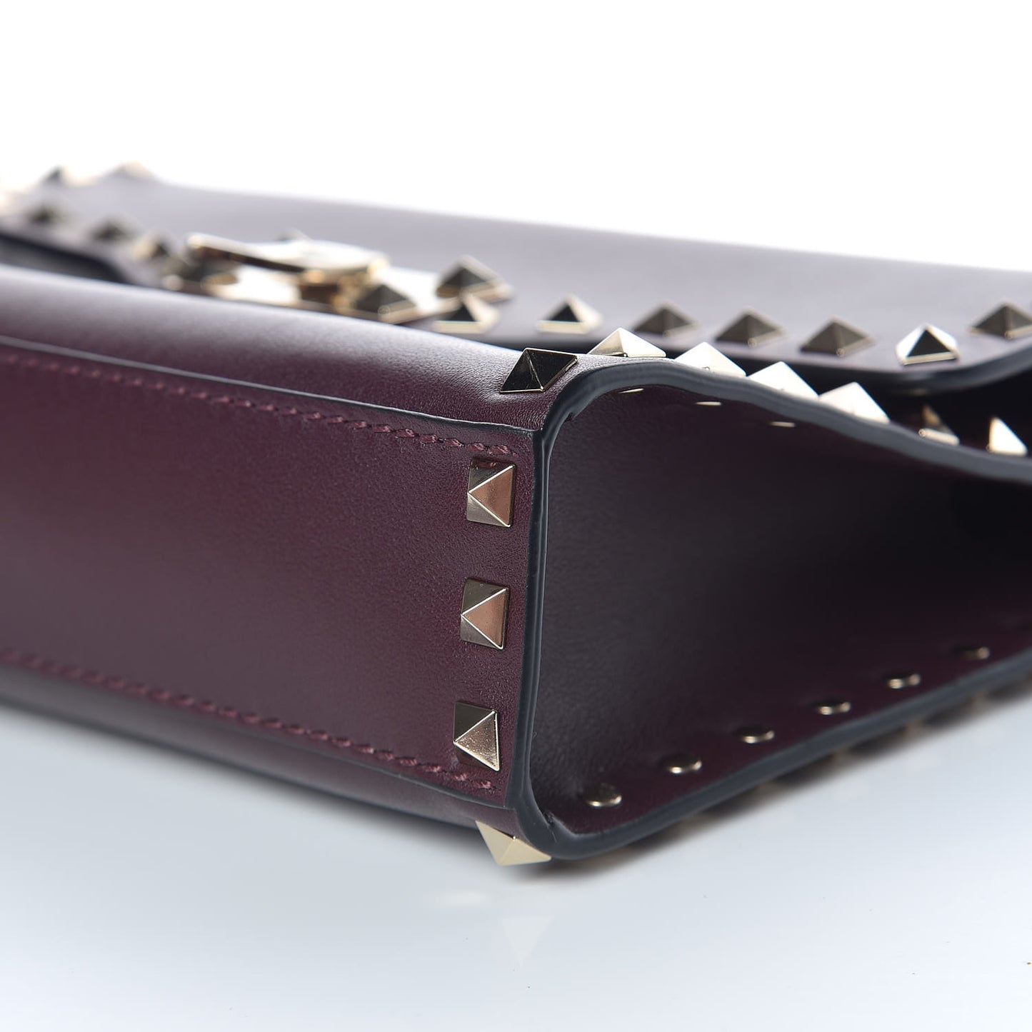 Vitello Medium Rockstud Flip Lock Crossbody Bag Rubin