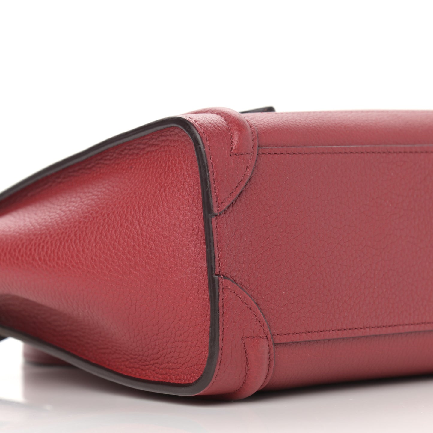 Drummed Calfskin Nano Luggage Ruby