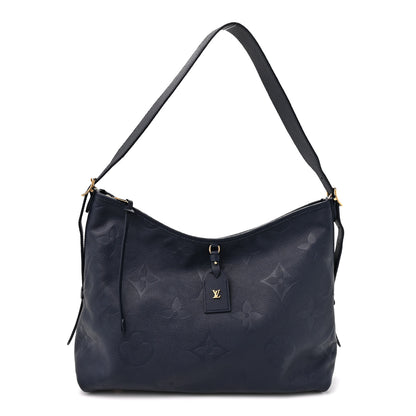 Louis Vuitton Empreinte Monogram Giant CarryAll MM Navy 1 of 9