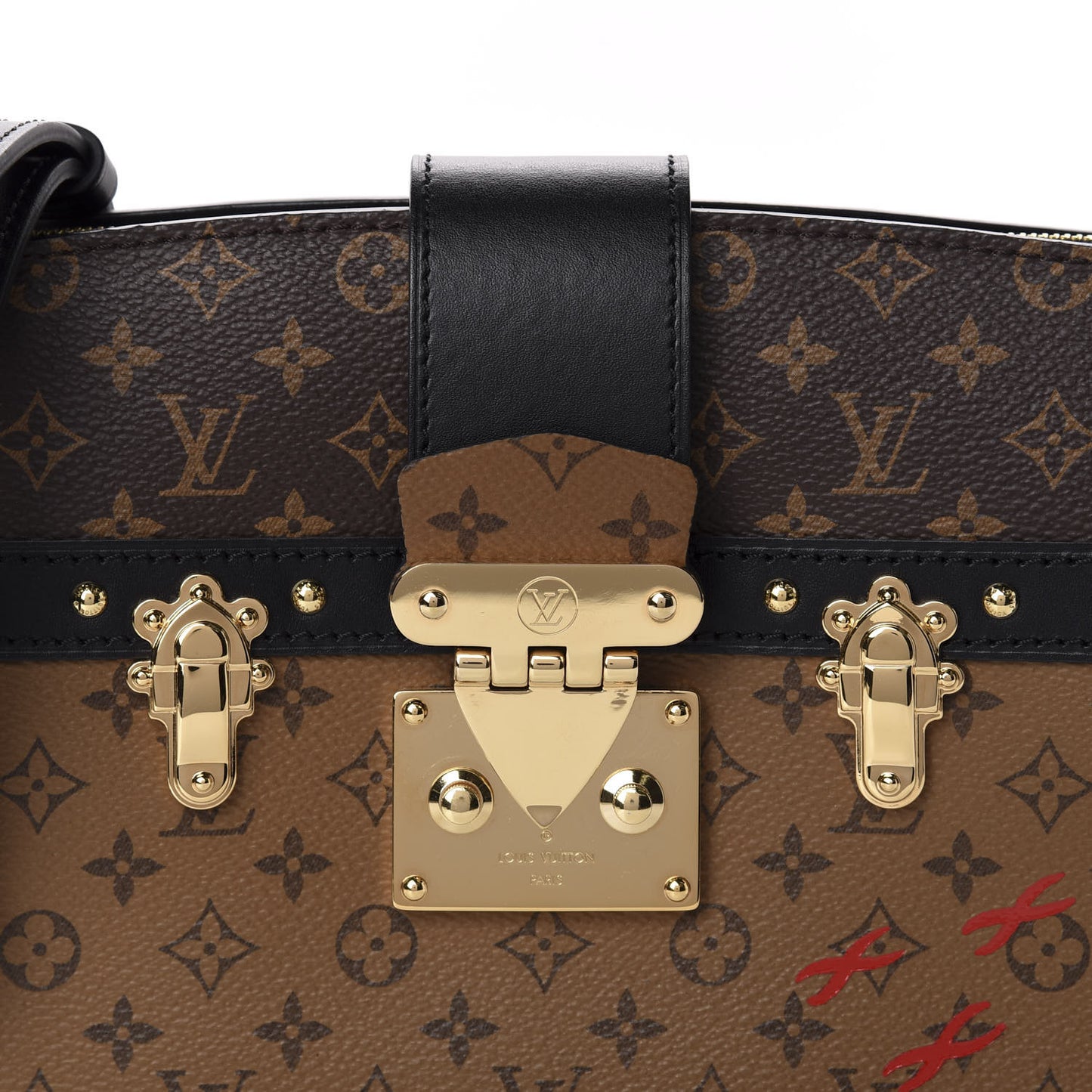 Reverse Monogram Trunk Clutch