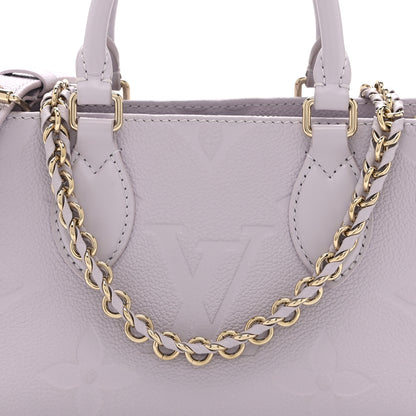 Louis Vuitton Empreinte Monogram Giant OnTheGo East West Misty Lilac 7 of 9