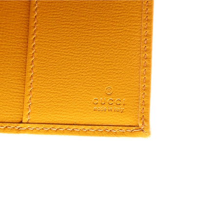 Gucci GG Supreme Monogram Textured Calfskin Retro Interlocking G Passport Case Beige Yellow 6 of 7