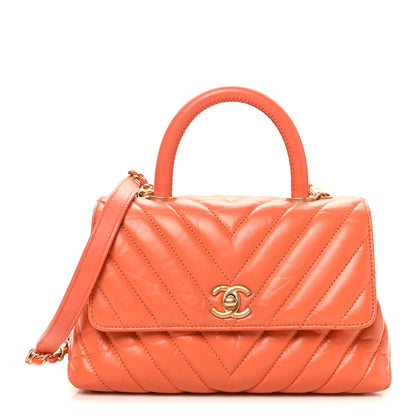 Chanel Aged Calfskin Chevron Quilted Mini Coco Handle Flap Orange 1 of 10