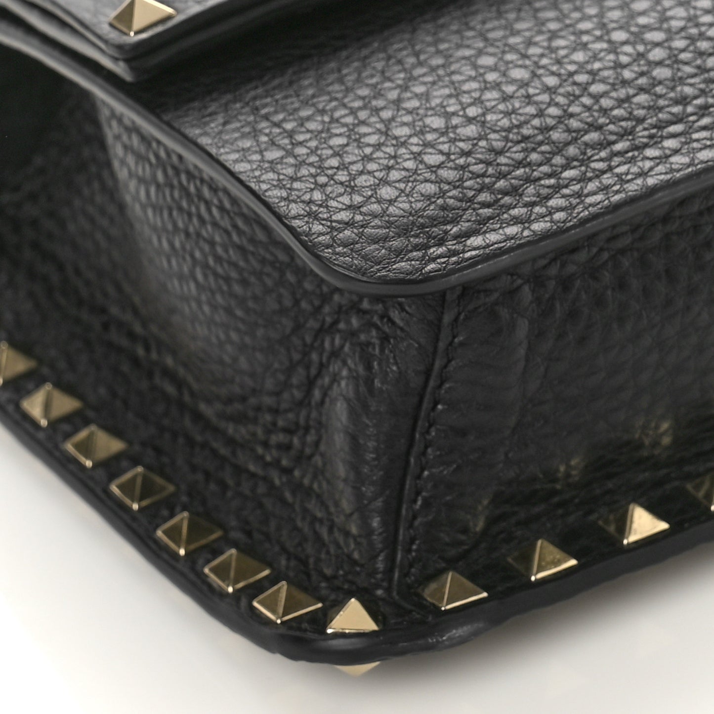 Pebbled Calfskin Rockstud Side Slip Crossbody Black