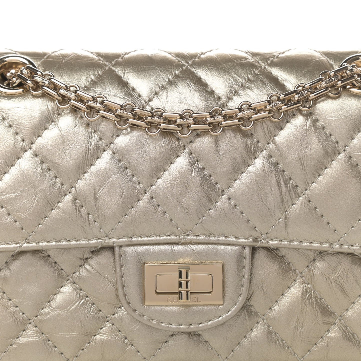 Metallic Aged Calfskin Quilted 2.55 Reissue Mini Flap Light Gold