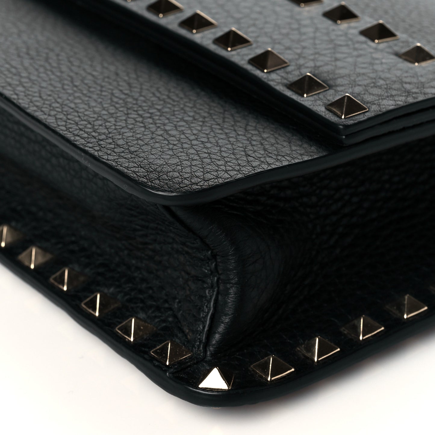 Pebbled Calfskin Rockstud Side Slip Crossbody Black