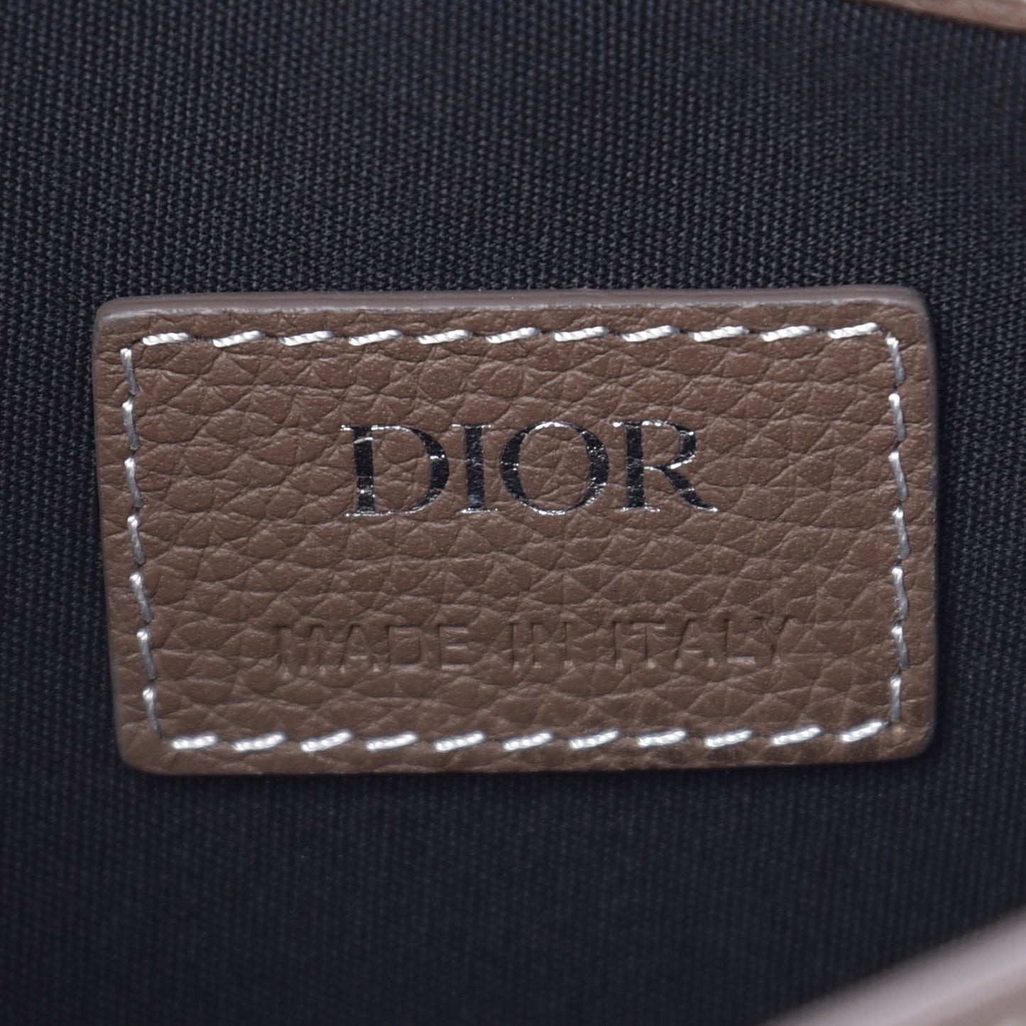 X KAWS Grained Calfskin Saddle Pouch Marron Multicolor