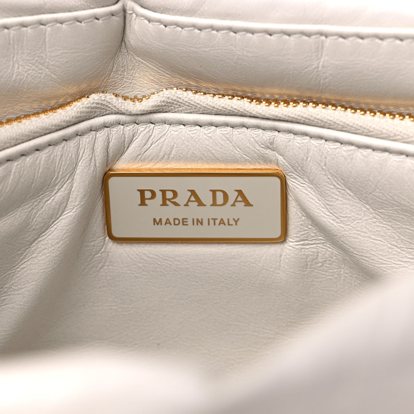 Nappa Soft Padded Logo Embossed Triangle Quilted Shoulder Bag White