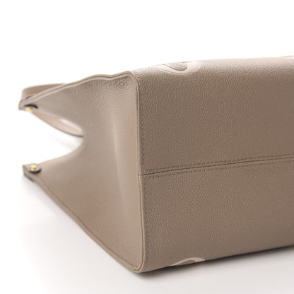 Louis Vuitton Empreinte Monogram Giant Onthego MM Tourterelle Creme 6 of 10