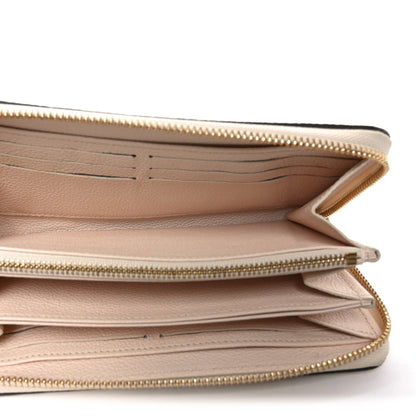 Louis Vuitton Empreinte Monogram Giant By The Pool Zippy Wallet Cream Saffron 5 of 6