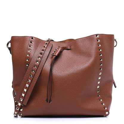 Valentino Garavani Pebbled Calfskin Rockstud Bucket Bag Saddle Brown 1 of 11