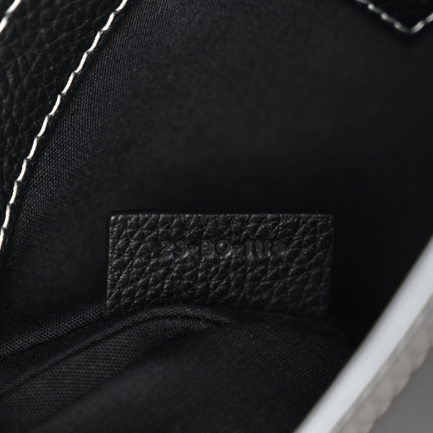 X KAWS Grained Calfskin Saddle Pouch Black