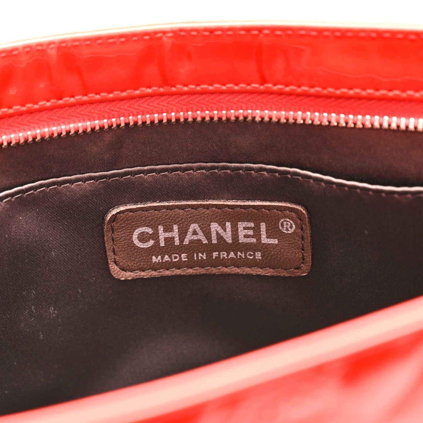 Patent Calfskin Lucky Symbols Pochette Coral