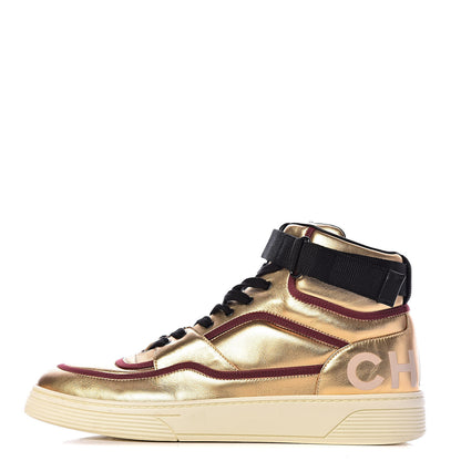 Chanel Metallic Satin Lambskin Mens Logo High Top Sneakers 44 Gold Burgundy 1 of 14